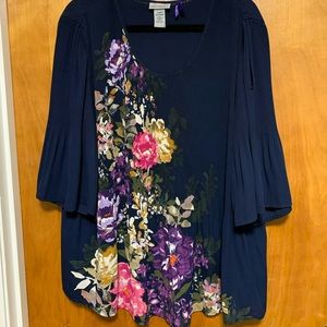 Catherine’s brand navy and floral blouse.